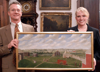 Auctioneer Ed Nadeau and his office manager and daughter Heather with one of the pair of folky oil on canvas depictions of the main road through Grafton, N.Y., by Carl W. Knudsen that sold for $126,000.