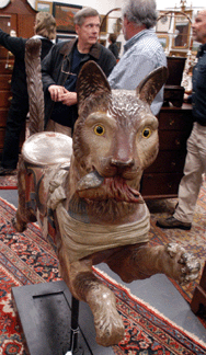 The Gustav Dentzel carousel figure of a cat realized $103,500.
