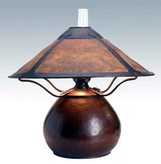 An exceptional and rare Dirk Van Erp hammered copper and mica table lamp was the top selling lamp of the day when it yielded $114,000.  