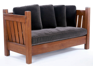 A rare Gustav Stickley even-arm crib settle fetched $33,000.