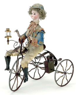 Surely the best-dressed cyclist of his day, this circa 1876 Roullet et Descamps automaton replicating a boy on a clockwork tricycle pedaled across the finish line at $34,100. 