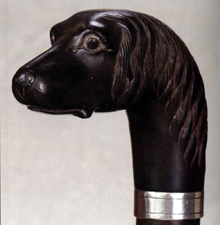 A Remington large doghead curio made $8,400.