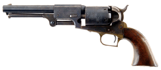 Scarce Colt 1st Model Dragoon Percussion Revolver in excellent condition ($40/60,000) sold for $138,000, setting a new world record for a standard 1st Model Colt Dragoon.