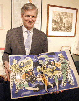 William Wyer, Ursus Books and Prints, New York City, with a 1950 copy of Le Cirque by Fernand Leger.