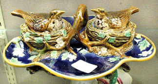 The George Jones double lidded inkstand with bird in nest motif brought $11,500.