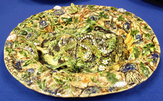 The Palissy ware plate decorated with snakes, snails, crayfish and a profusion of plants, ferns and fauna had been made by Charles-Jean Avisseau. It sold at $3,910.