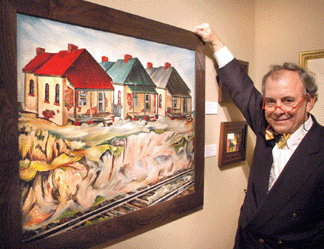 Patrick Albano of Aaron Galleries, Chicago, with a painting titled "Shotgun House Row” by Albert Wells.