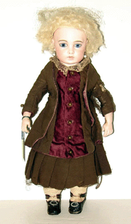 Circle Dot French Bru doll (circa 1895), 14 inches with open/close mouth, original frock and undergarments, and signed shoes made $11,550.
