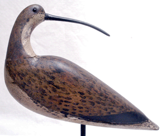 The turned head Hudsonian curlew by Quogue, Long Island, carver Thomas Gelston, Mackey collection, sold for $450,500, a record price for a New York decoy.