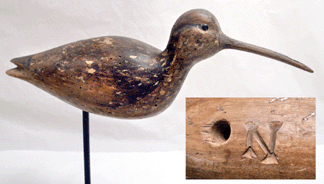 The Nathan Cobb large and plump curlew from the Mackey collection was in outstanding dry original paint and was marked with the serifed "N.” It had been exhibited at Mackey's landmark IBM exhibition in Manhattan in 1966 and also illustrated in a 1964 issue of Antiques Magazine. The classic split-tail curlew sold for $390,000, establishing a record price paid at auction not only for Nathan Cobb, but also for a Virginia decoy.