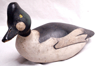 The Ward Brothers swimming goldeneye drake with a slightly cocked head sold for $109,250.
