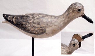 The yellowlegs by Massachusetts carver Melvin Gardner with an unusual slotted head with replaceable bill, Mackey collection, sold at $40,250.