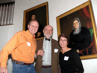 Exhibitors were warmly welcomed at the home of 2006 co-chair Stew Stender and his wife, Deb Davenport, left and right, who hosted a dinner during setup. Christopher Monkhouse, center, the Minneapolis Institute of Art's James Ford Bell curator of architecture, design, decorative arts, craft and sculpture, offered remarks and thanks.