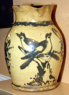 First-time exhibitor Raccoon Creek Antiques of Oley, Penn., had a great show. A highlight of its corner display was this Fulper Pottery jug with cobalt decoration of double birds and baskets.