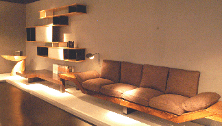 A Charlotte Perriand built-in sofa and table designed and executed for her home in Brazil was displayed by Galerie Downtown, Paris.
