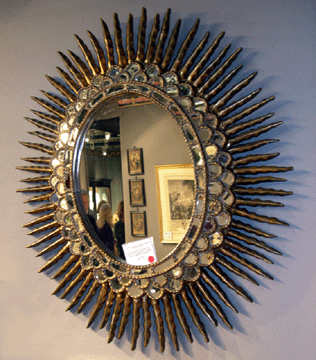 A Peruvian giltwood framed mirror from about 1900 was one of a number of such mirrors offered by Georgian Manor's Enrique Goytizolo from his native Peru. Quite a few sprouted sold stickers early in the preview.