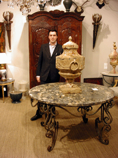 Christopher Jones of Pomfret House, Northamptonshire, England, specializes in Eighteenth–early Twentieth Century decorative antiques. Seen here with an extraordinary French faux marble glazed pottery urn, possibly by Lambert, priced at $19,000.