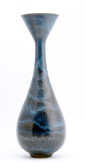 Natzler, tall bulbous vase covered in blue crystalline glaze, sold for $252,000. 