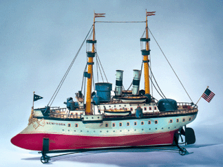 The USS New York was launched in 1893. This circa 1900 representation of the famous ship is a fine example of history influencing the toy industry, as well as of the German firm Märklin's predominance in toy shipbuilding. Old Salem Toy Museum.
