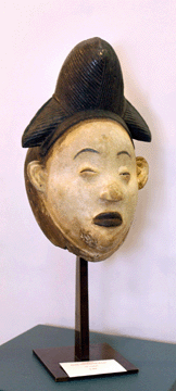 Female ancestor mask, late Nineteenth Century, from the Punu tribe, Gabon, at Malloy Tribal Art, New York City.