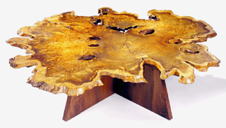 George Nakashima, "Arlyn” table, 1988, redwood, American black walnut, East Indian laurel, madrona burl, sold for $822,400.