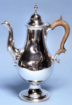 This 1792 coffeepot by John Walraven of Baltimore features a pear-shaped body, scrolled spout and double domed lid typical of rococo pots popular about 30 years prior to its making. 