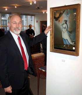 Skinner auctioneer Stephen L. Fletcher with the Goddess of the Liberty that sold to Boston dealer Stephen Score on behalf of a client for $336,000. The China Trade reverse painting on glass is patterned after Edward Savage's oil on canvas original, published as an engraving in 1796. Patriotic references include the eagle, flag, liberty cap, Doric column, a key to the Bastille and the Boston lighthouse in the distance. —Laura Beach photo