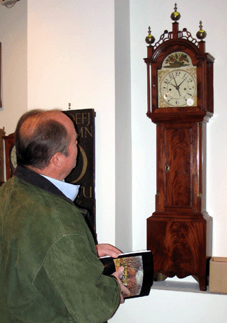 An attractive collection of clocks included this circa 1825 Federal mahogany dwarf time-piece by Joshua Wilder of Hingham, Mass. Measuring 50½ inches tall, the piece sold to an absentee bidder for low estimate, plus premium, $58,750. —Laura Beach photo