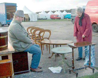 Steven Dochert, Montrose, Scotland, was selling to Marcia Armstrong, Lyme Creamery Antiques, Lyme, N.H., after the Tuesday morning opening.