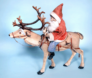 Striking scale, Santa Riding Reindeer clockwork example measuring 24 inches high realized $29,120, bringing applause of approval from collectors.