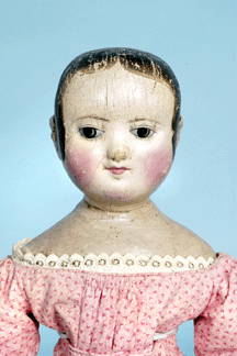 The epitome of American folk art dolls, and in fine condition, this 17-inch Barefoot Izannah Walker fetched $22,400.