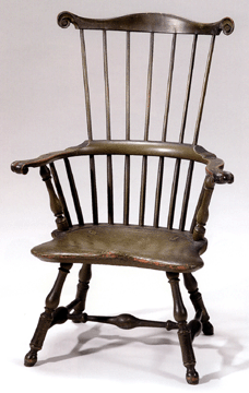 A diminutive comb back Windsor armchair in green paint was the top lot of the weekend, achieving $65,725.