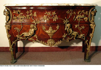 With approximately 250–275 registered bidders and very active phones at its January 1 "Le Grand” auction in Patchogue Village, N.Y., Thos. Cornell Galleries sold this French heavily bronze ornamented marble top commode for $39,100.