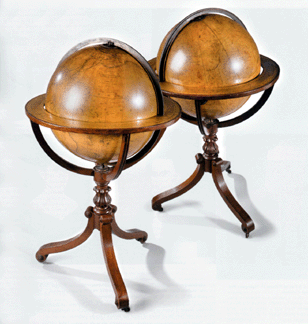 A pair of English 20-inch library globes, 1850, by Newton & Son, London, globe, sold for $67,000.