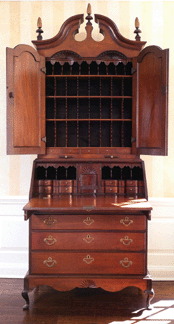 The fourth highest lot in the sale was this Queen Anne carved and figured mahogany bonnet-top desk and bookcase on frame, Hartford County, probably Middletown, Conn., 1770–1790. It measures 91 inches high, 35½ inches wide, and sold to Leigh Keno American Antiques for $420,000, just under the $500,000 high estimate.