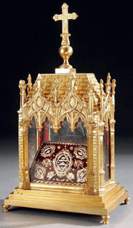 This late Nineteenth Century French gilt bronze reliquary brought $10,500. 