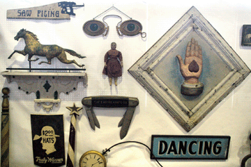 Trade signs were popular in the booth of American Arts, Franklin, Tenn., with the spectacles sign and the pocket knife sign selling as the show opened.