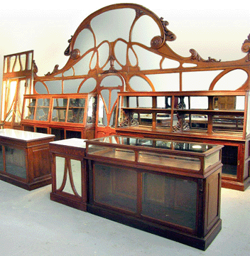 The audience sat up and took notice when an outrageously designed and carved oak Art Nouveau bakery interior, carefully removed from a turn-of-the-century bakery, was offered. After some strong bidding from phone, Internet and the floor, the lot sold to a New York City restaurant owner for $97,750.