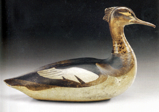 Made by Kingston, Mass., carver Lothrop Holmes and dating to the mid to late Nineteenth Century, this red-breasted merganser hen branded on its underside "L.T. HOLMES” sold to a collector bidding by phone for $856,000 ($400/600,000), an auction record for an American decoy. Connecticut dealer Fred Giampietro sold a Holmes drake at last year's Winter Antiques Show, reportedly for around $500,000.