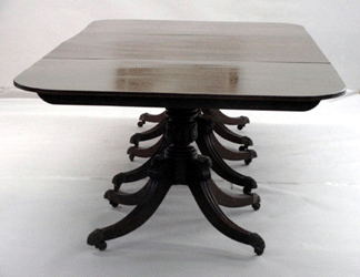 A triple pedestal dining table fetched $28,750.