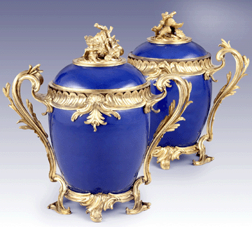 Pair of deep blue Chinese porcelain jars, first half of the Eighteenth Century, with French gilt-bronze mounts, 1745–49; 17 7/8  by  18 5/8  by 10 11/16  inches and 18 7/16  by 18 5/8  by 10 5/8  inches; The Frick Collection, New York. —Michael Bodycomb photo