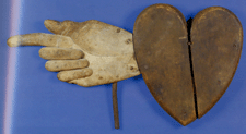 This painted folk art carving of a heart and hand from the collection of former Boston dealer George Gravert went to a phone bidder for 79500
