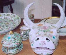 The Chinese Export famille rose porcelain tureen in the form of a bull fetched 1494 and the Nineteenth Century famille rose celadon porcelain covered sauce tureen sold for 891