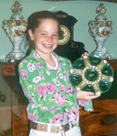 Kelly Hawriluk holds one of three Minton majolica oyster plates two of which went to the same buyer for 1760 and the third with a chip left at 660