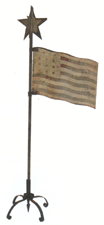 A painted sheet tin American flag weathervane reached 6325