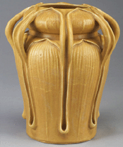 A Grueby Kendrick organic matte mustard glazed vase on the catalog cover was also the opening lot and reached 52875
