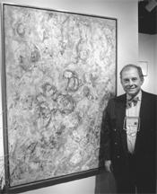 Patrick Albano of Aaron Galleries Chicago with the Beaufort Delaney painting