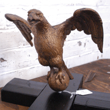 A sum of 32200 was paid for this Salem carved and gilded eagle finial attributed to Samuel McIntyre