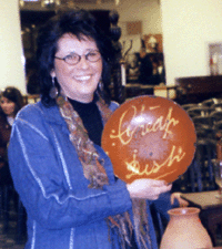 Ginny Kabe with the top redware dish 3335