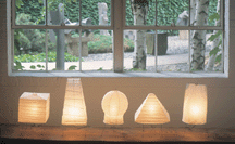 Akari table lamps Handmade washi paper bamboo ribbing supported by metal frame Photo by John Berens